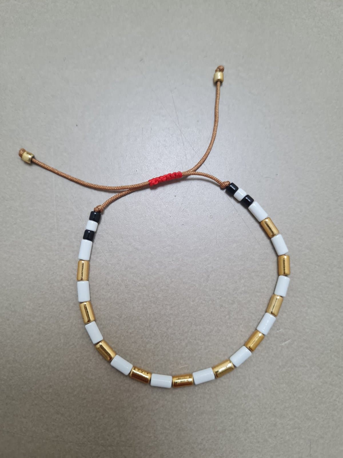 Armband goud en zilver schakeltjes