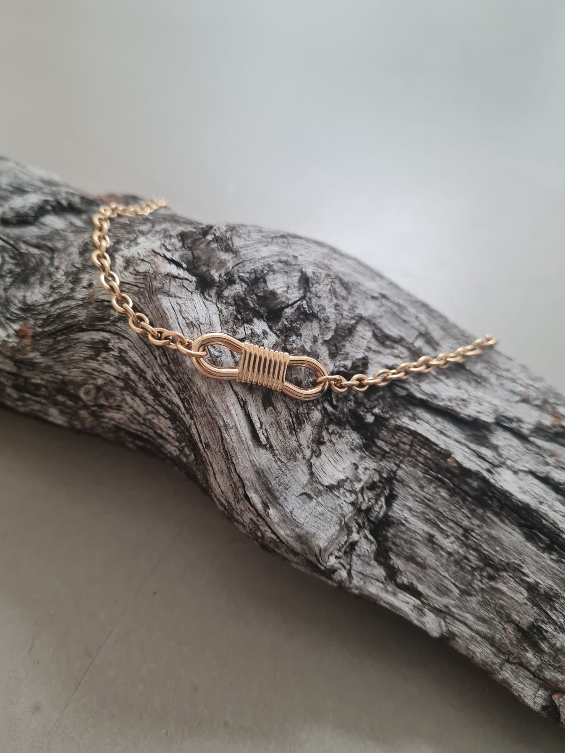 Armband goud met midden schakel
