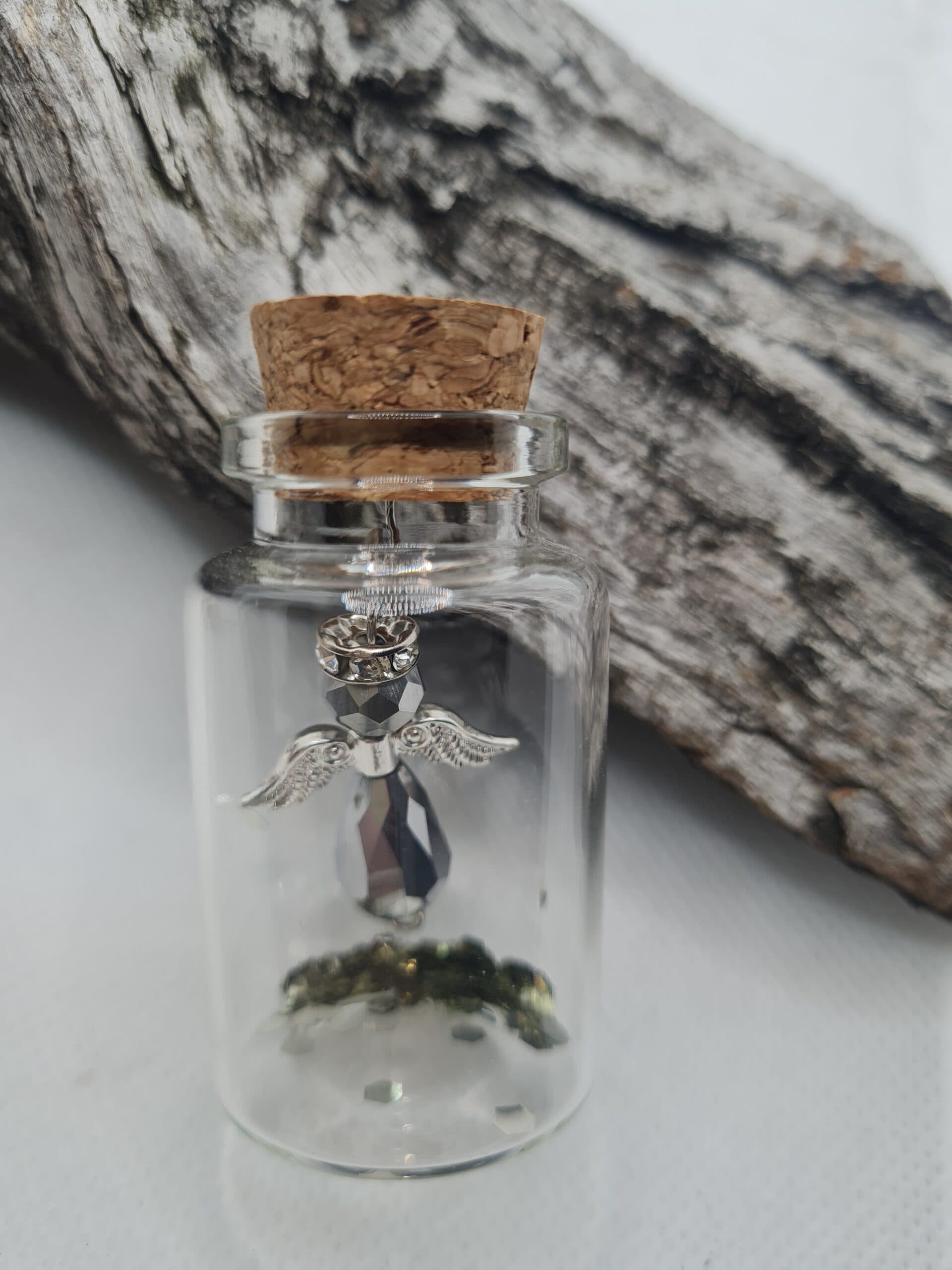 Engel in flesje zilver