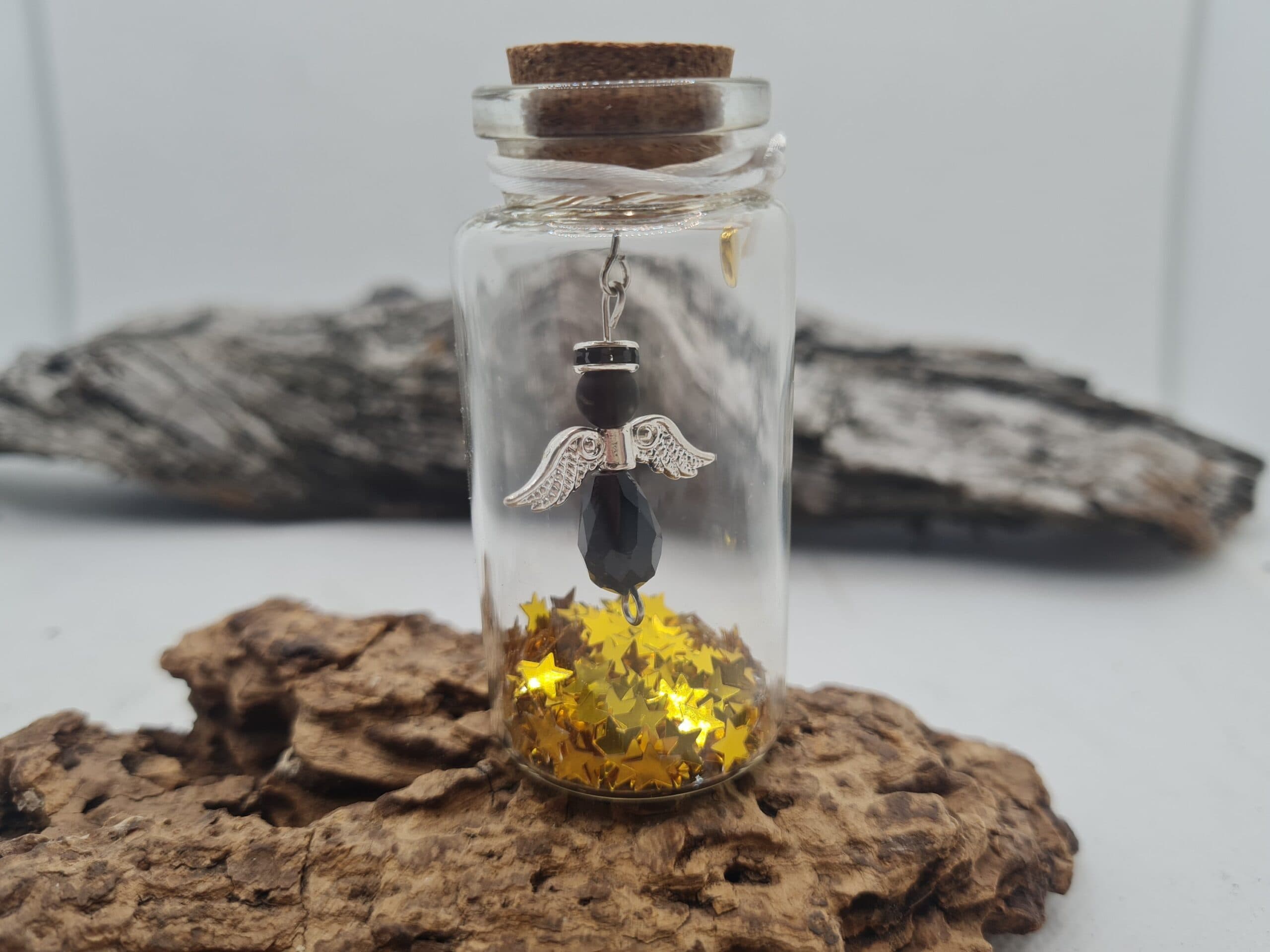 Engel in flesje, zwart met goud